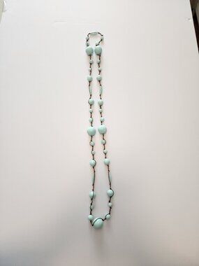 Blue Turquoise beads on hand knotted string necklace